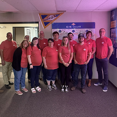 Althoff Core Values shirts office group photo